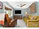 Comfortable living room with a large window, ceiling fan, and cozy seating arrangement at 3004 Vernell Ln, Shelby, NC 28150
