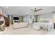 Spacious main bedroom features a sitting area, ceiling fan, and access to a private patio at 3004 Vernell Ln, Shelby, NC 28150