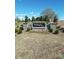 Stone signage for the Wellington Pointe community, surrounded by manicured landscaping at 309 Knotty Wood Dr # 78, Monroe, NC 28110