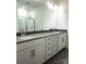 Bathroom with a double sink vanity, stylish countertops, and modern fixtures at 313 Knotty Wood Dr # 79, Monroe, NC 28110
