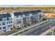Aerial view of newly constructed townhomes showcasing modern architecture and landscaping at 3626 S Tryon St # 21, Charlotte, NC 28217