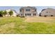 Home with spacious backyard and solar panels, showcasing outdoor living potential at 8137 Bryson Rd, Fort Mill, SC 29707