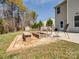 Backyard fire pit area with seating, perfect for outdoor entertaining and relaxation at 8137 Bryson Rd, Fort Mill, SC 29707