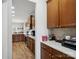 Bright kitchen featuring wood cabinets, quartz countertops and stainless steel appliances at 8137 Bryson Rd, Fort Mill, SC 29707