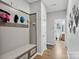 Mudroom entrance with board and batten walls, coat hooks, and bench seating at 8137 Bryson Rd, Fort Mill, SC 29707