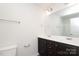 Bathroom featuring double vanity with sinks, mirror, and tub-shower combo at 8232 Waxhaw Hwy, Waxhaw, NC 29173