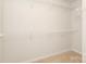 Walk-in closet with white wire shelving and carpeted floor at 8232 Waxhaw Hwy, Waxhaw, NC 29173