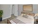 Bright bedroom with hardwood floors, view to hallway, and modern bed at 1034 Marietta St, Charlotte, NC 28214
