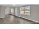 Bright living room with neutral paint, recessed lighting, and modern flooring at 1034 Marietta St, Charlotte, NC 28214