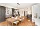 Bright dining area with wood floors and an elegant light fixture at 10602 Country Squire Ct, Matthews, NC 28105