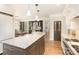 Spacious kitchen featuring a large island, granite countertops, stainless steel appliances, and open layout perfect for entertaining at 10602 Country Squire Ct, Matthews, NC 28105