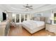 Spacious main bedroom featuring hardwood floors and a sitting area at 10602 Country Squire Ct, Matthews, NC 28105