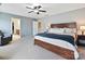 Spacious primary bedroom suite featuring light-blue paint and neutral carpet at 11621 Red Knoll Ln, Pineville, NC 28134