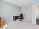 Study or office with neutral carpet, natural light, and space for a desk and chair at 11621 Red Knoll Ln, Pineville, NC 28134