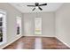 Cozy bedroom features neutral walls, laminate flooring, and natural light at 119 Tilton Dr, Mooresville, NC 28115