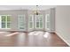 Sunny dining area features hardwood floors and plenty of natural light at 119 Tilton Dr, Mooresville, NC 28115