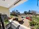 Cozy covered back porch with stone flooring and nice views at 121 Hanks Bluff Dr, Mooresville, NC 28117