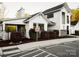 Community clubhouse featuring well-maintained landscaping and ample parking at 121 Hanks Bluff Dr, Mooresville, NC 28117