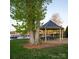 Beautiful waterfront gazebo with picnic tables and serene views of the lake at 121 Hanks Bluff Dr, Mooresville, NC 28117