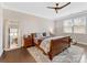 Elegant main bedroom showcasing a large bed, a decorative rug, and ample natural light at 121 Hanks Bluff Dr, Mooresville, NC 28117