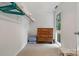Walk-in closet offers shelving and a window with natural light at 121 Rhinehill Dr, Mooresville, NC 28117