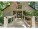 Charming covered front entrance boasts double doors and unique architectural details at 121 Rhinehill Dr, Mooresville, NC 28117
