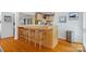 Eat-in kitchen featuring breakfast bar, ample counter space, and stainless steel appliances at 121 Rhinehill Dr, Mooresville, NC 28117