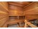 Cedar sauna features wooden benches for comfort and relaxation at 121 Rhinehill Dr, Mooresville, NC 28117
