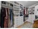 Walk-in closet with custom shelving and rods for ample storage space at 12619 Old Westbury Dr, Cornelius, NC 28031