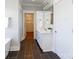 Bright bathroom features a neutral vanity, mirror, and an adjacent walk-in closet at 1300 Aragon Beach Rd, Rock Hill, SC 29732