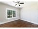 Bedroom with hardwood floors and a large window at 1300 Aragon Beach Rd, Rock Hill, SC 29732