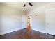 Bedroom has hardwood floors with open door to bathroom at 1300 Aragon Beach Rd, Rock Hill, SC 29732