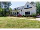 Charming two-story modern farmhouse with manicured lawn and tasteful landscaping at 1300 Aragon Beach Rd, Rock Hill, SC 29732