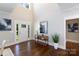Bright foyer boasts hardwood floors, high ceilings, and natural light from a glass paneled front door at 1300 Aragon Beach Rd, Rock Hill, SC 29732