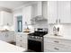 Clean kitchen with white cabinets, subway tile backsplash, and stainless steel oven range at 1300 Aragon Beach Rd, Rock Hill, SC 29732