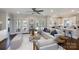 Open-concept living area showcases access to a kitchen and outdoor entertaining space at 1300 Aragon Beach Rd, Rock Hill, SC 29732