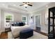 Spacious main bedroom featuring tray ceilings, neutral paint, and great natural light at 1300 Aragon Beach Rd, Rock Hill, SC 29732