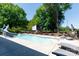 Backyard pool with surrounding lounge chairs and slide, perfect for summer enjoyment at 1300 Aragon Beach Rd, Rock Hill, SC 29732