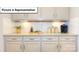 Well-appointed kitchen counter with granite countertops and classic subway tile backsplash at 140 Asmodean Ln, Troutman, NC 28166