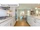 Modern kitchen boasting stainless steel appliances and open layout at 140 Asmodean Ln, Troutman, NC 28166