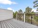 Spacious outdoor deck with sleek railing, offering a perfect spot for relaxing and enjoying scenic views at 1413 Kenilworth Ave, Charlotte, NC 28203