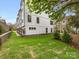 Clean white townhomes with lush green lawns and contemporary design, providing a visually appealing and comfortable environment at 1413 Kenilworth Ave, Charlotte, NC 28203
