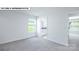 Bedroom with neutral carpet, white walls, and a view into the bathroom and another room at 134 Asmodean Ln, Troutman, NC 28166