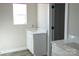 Bright bathroom features new vanity with a white countertop, adding a touch of elegance to the space at 1432 Blackbird Dr, Clover, SC 29710