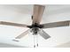 Modern ceiling fan with wooden blades and a glass light fixture at 1432 Blackbird Dr, Clover, SC 29710