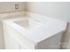 Close up on a white countertop, showing its clean lines, sleek design, and subtle veining at 1432 Blackbird Dr, Clover, SC 29710