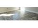 Close-up of wood-look flooring, highlighting its texture and light color that complements the room's design at 1432 Blackbird Dr, Clover, SC 29710