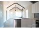 The kitchen overlooks the living area, featuring white cabinets and stainless steel appliances at 1432 Blackbird Dr, Clover, SC 29710