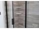 Close-up of a shower with corner shelves and decorative tiling, perfect for a modern bathroom at 1432 Blackbird Dr, Clover, SC 29710