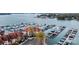 Aerial view showing a harbor with numerous boats and a building with red roofing at 18009 Kings Point Dr # C, Cornelius, NC 28031